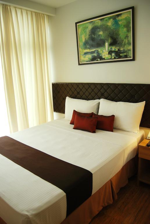 Capitol Central Hotel And Suites Cebu Стая снимка