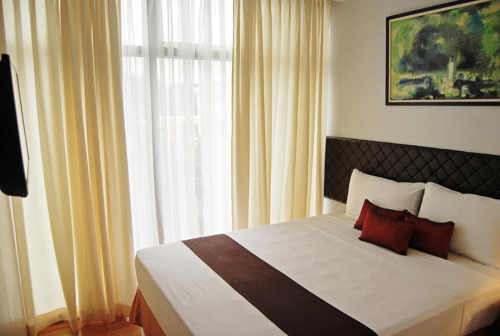 Capitol Central Hotel And Suites Cebu Стая снимка